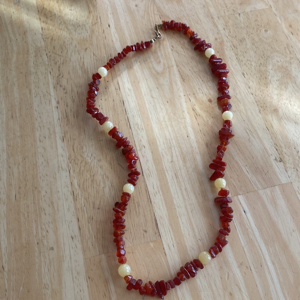 Vintage stone chip & beaded necklace about 20 inches. Red stones & yellow beads.